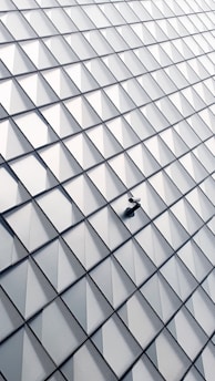 white and black glass walled building