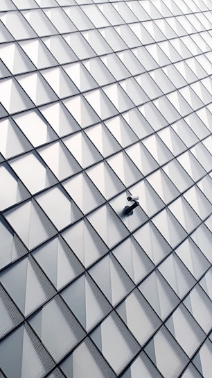 white and black glass walled building