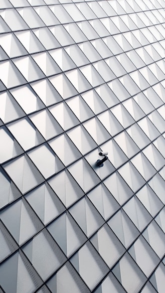 white and black glass walled building
