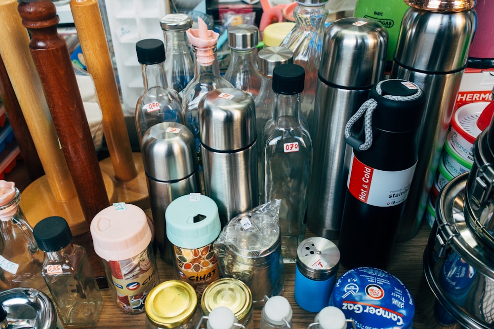 clear glass bottle on table