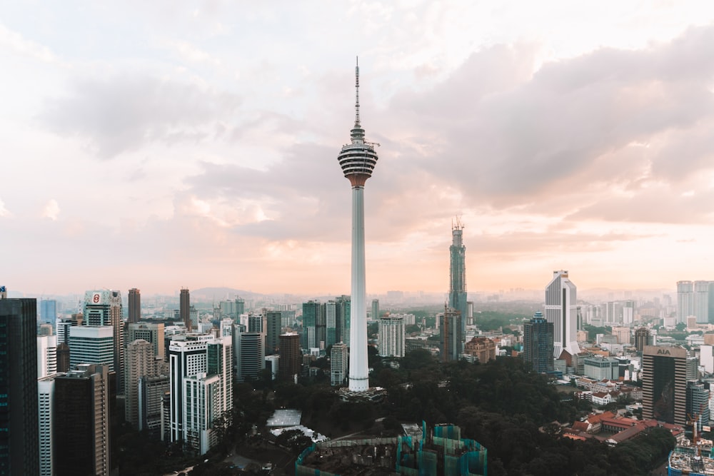 city skyline under white cloudy sky during daytime