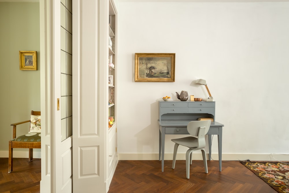 white wooden table near white wooden door