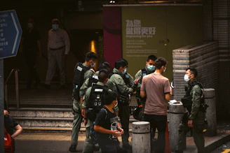 people walking on sidewalk during daytime