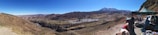 A panoramic view of the Ecuadorian landscape with trade elements.
