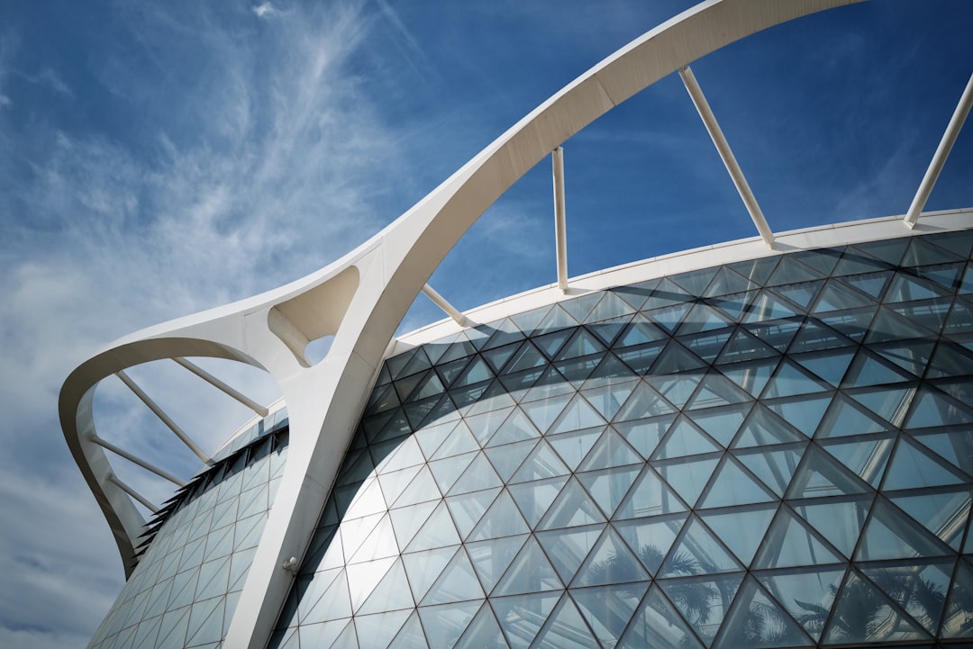 white concrete building under blue sky during daytime