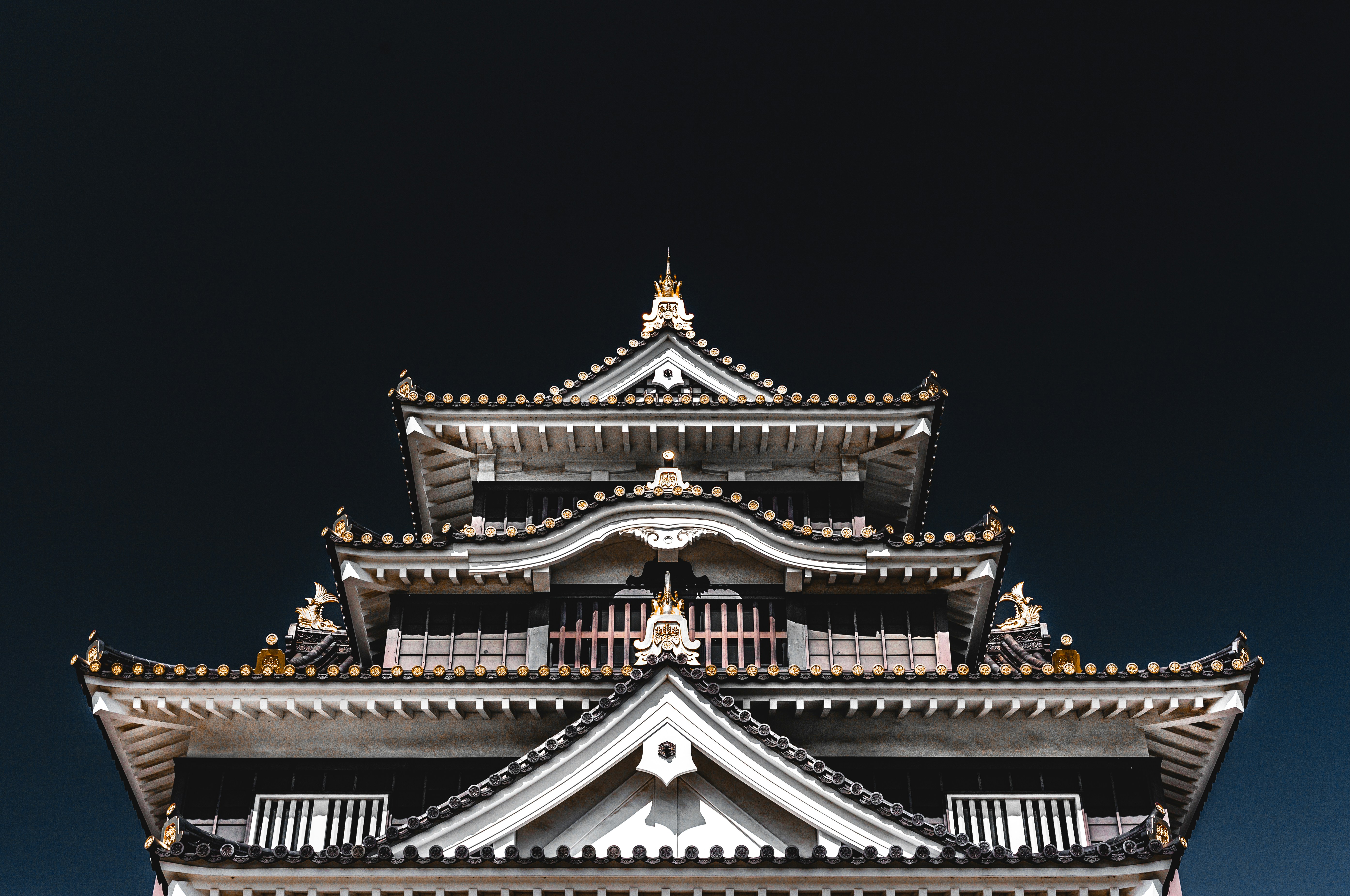 white and gold temple during night time