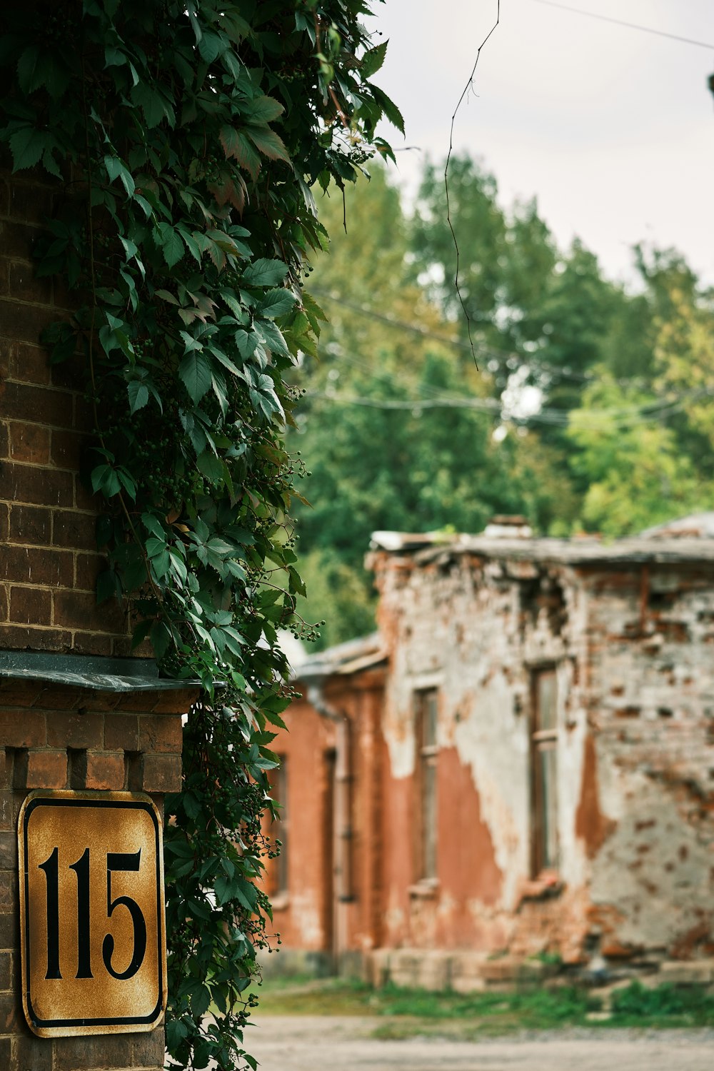 a number fifteen sign on a brick wall