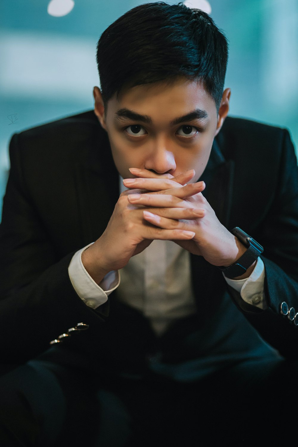 man in black suit jacket