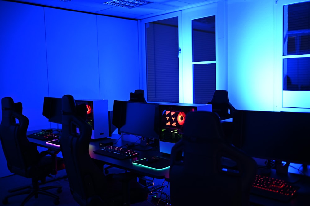 people sitting on chair in front of computer