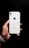 A hand holding a white smartphone with a visible brand logo and camera on the back. The background is a solid black, enhancing the contrast with the phone.