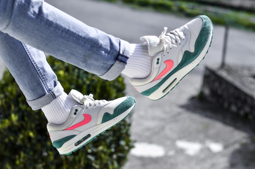 Person in blue denim jeans and white nike sneakers photo – Free Airmax  Image on Unsplash