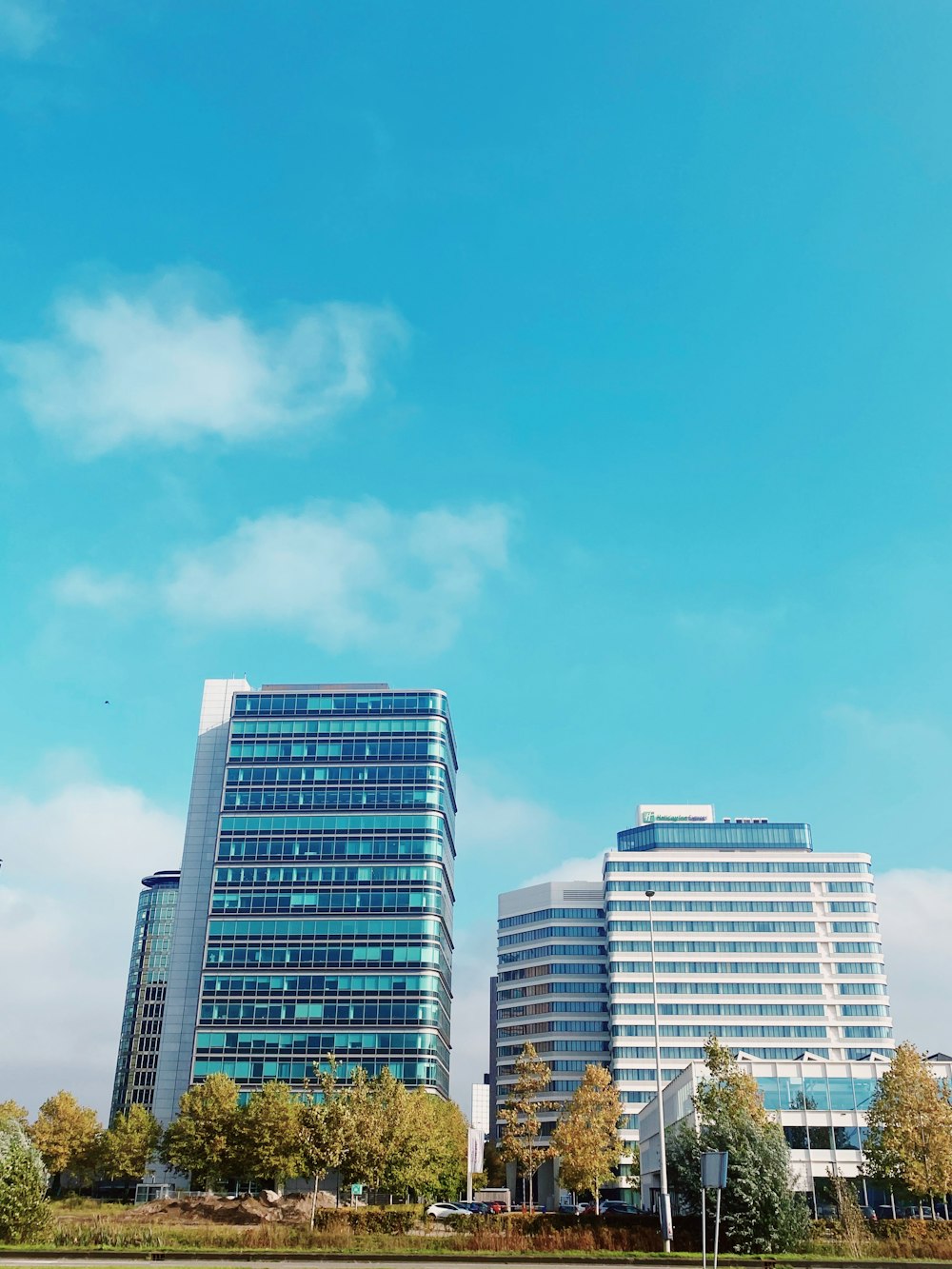 city buildings under blue sky during daytime