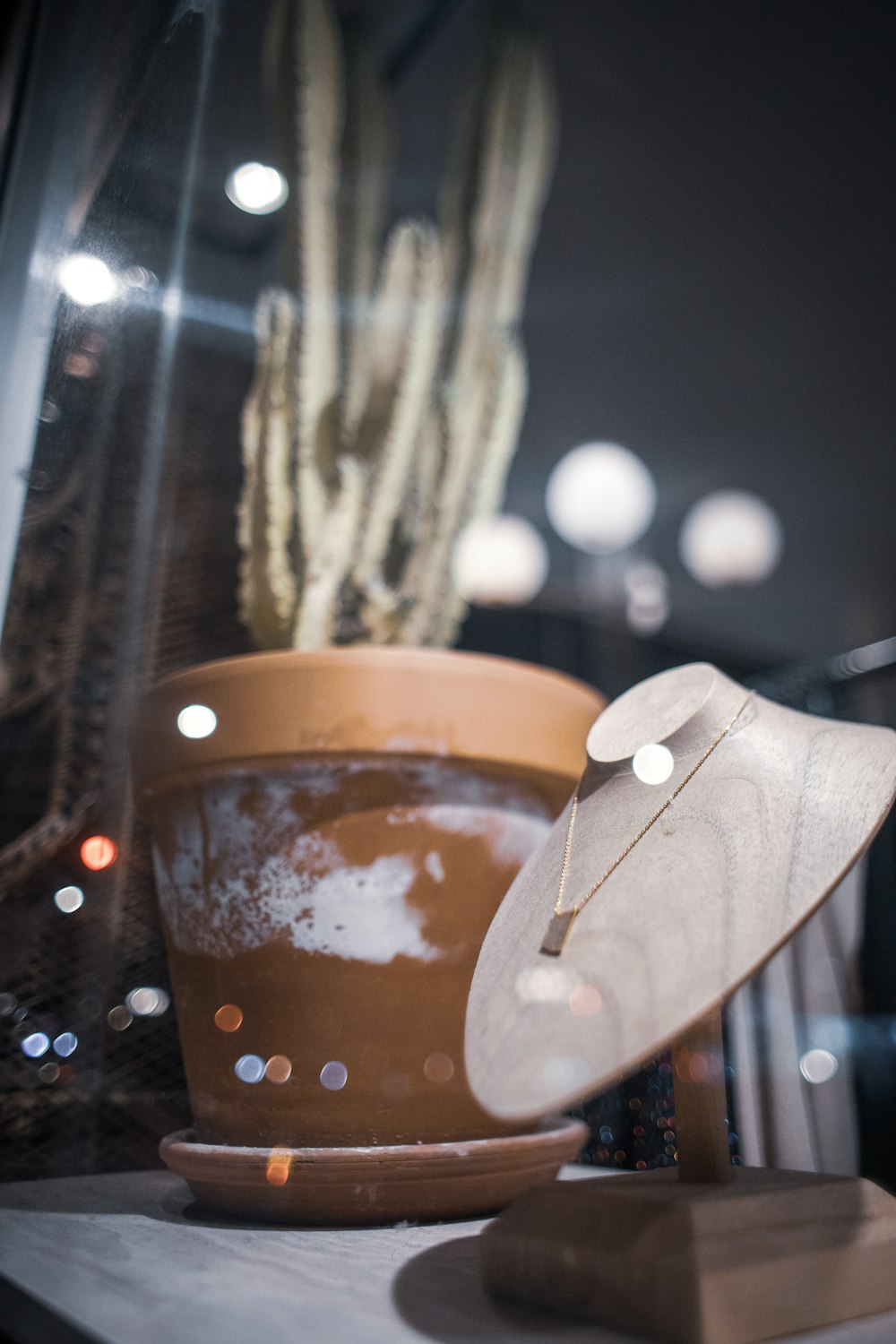 clear plastic cup with brown liquid