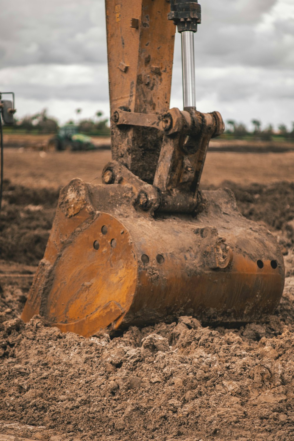 brown metal machine on brown soil during daytime