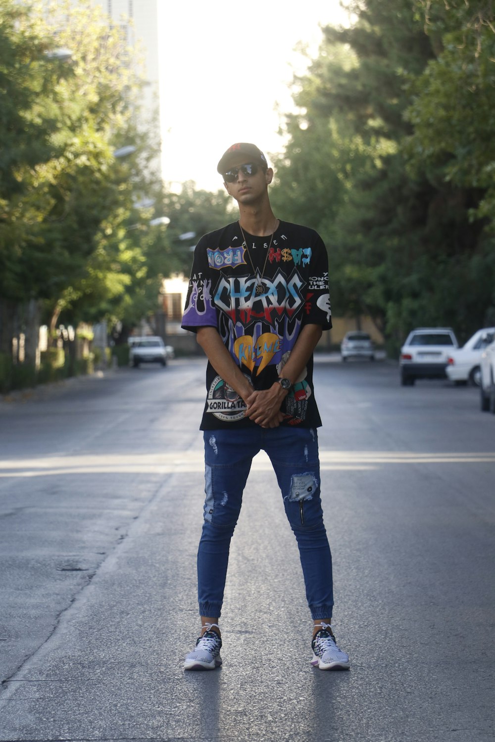 a man standing in the middle of a street