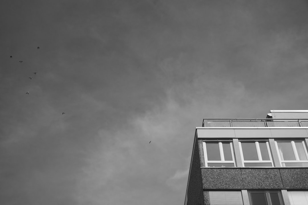 grayscale photo of concrete building