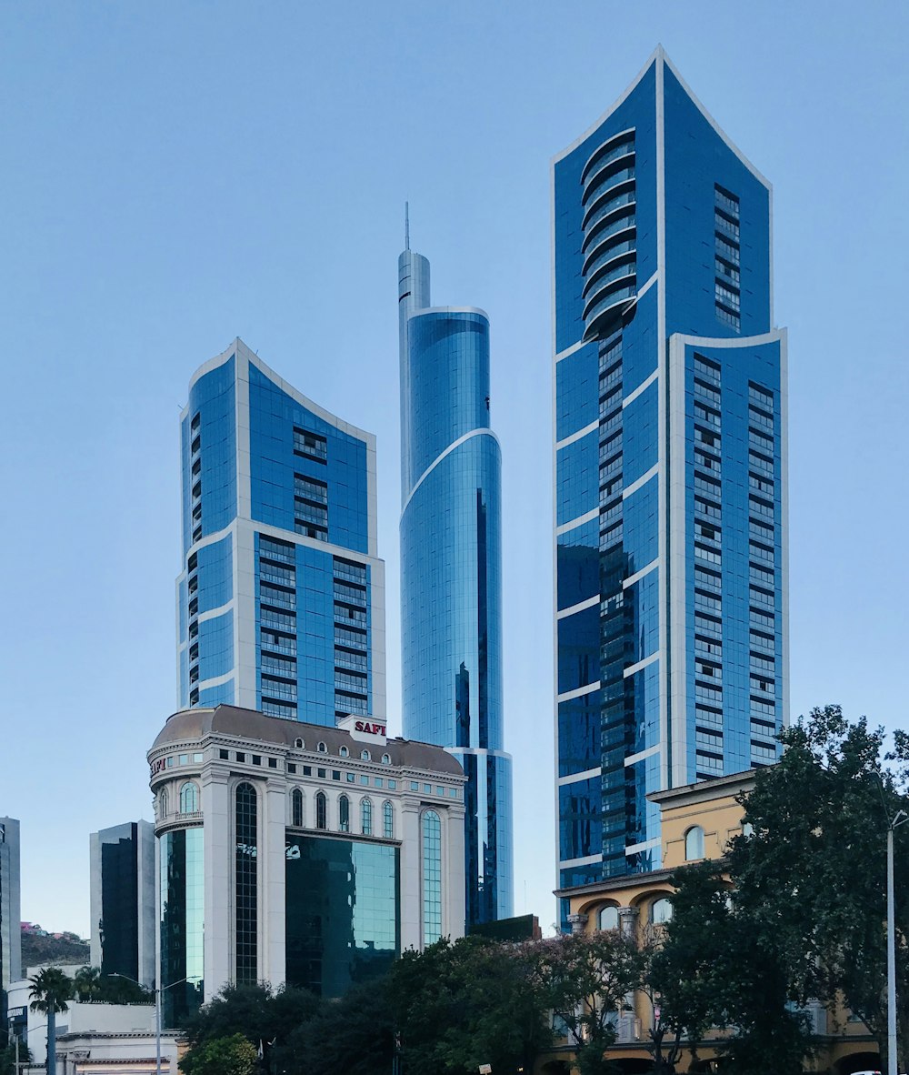 white and blue high rise building