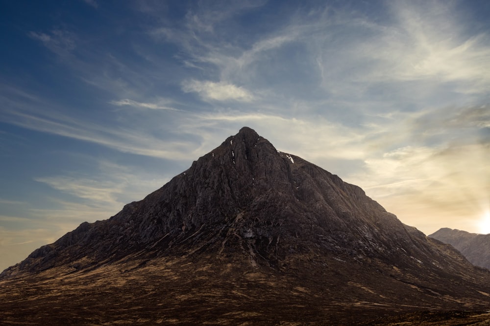 brown and gray mountain under blue sky during daytime