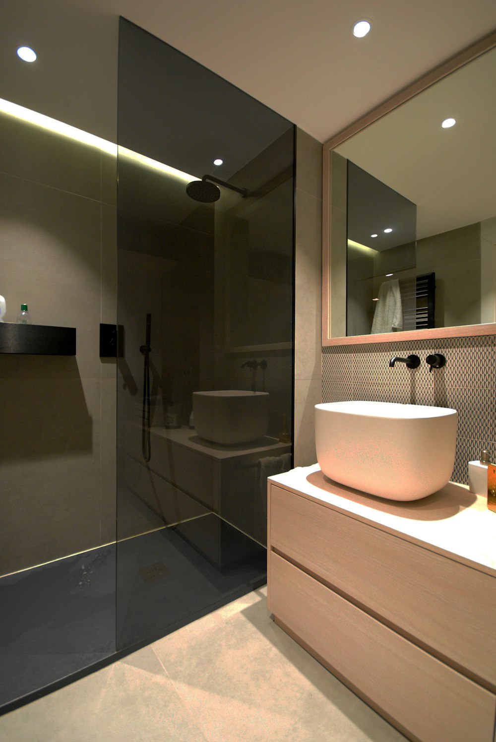 white ceramic sink near mirror