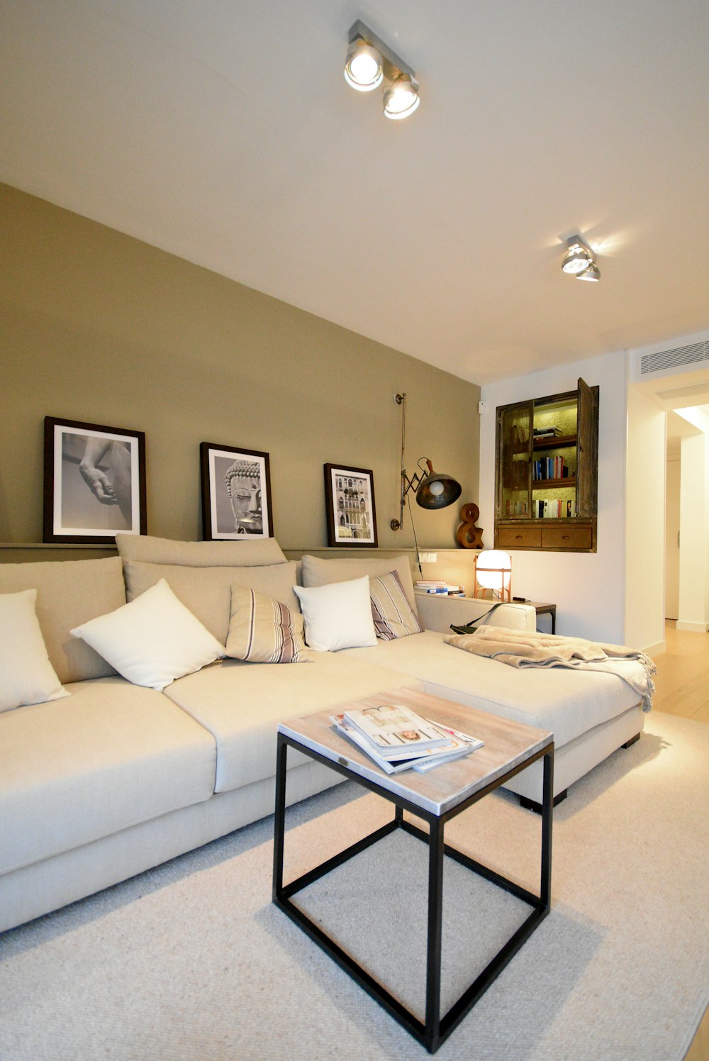 white couch with throw pillows