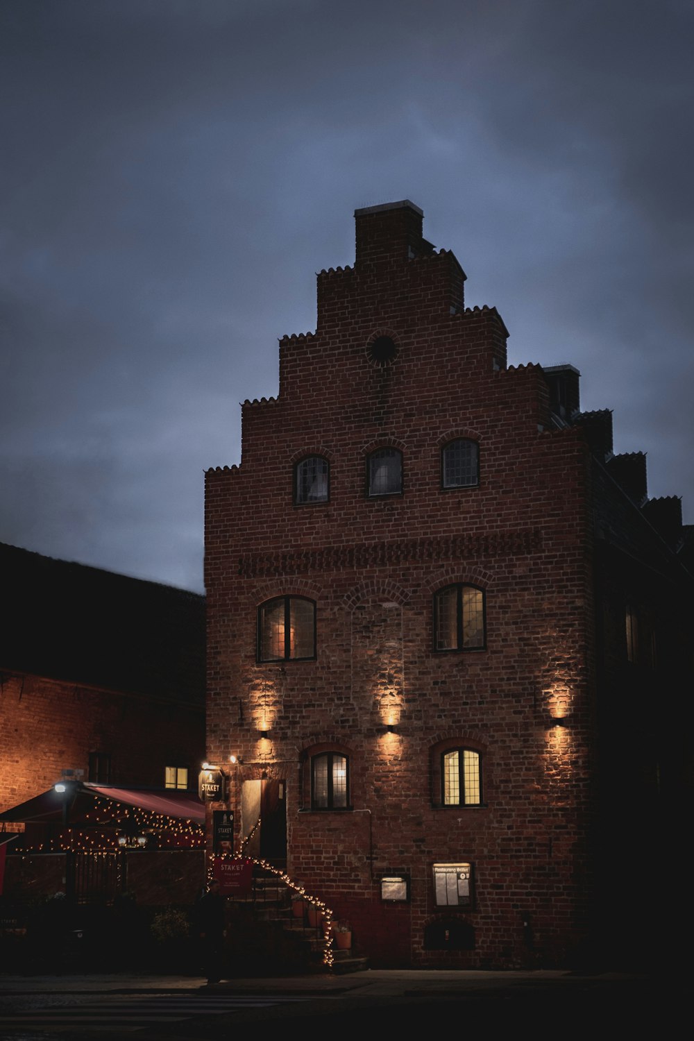 brown concrete building during night time