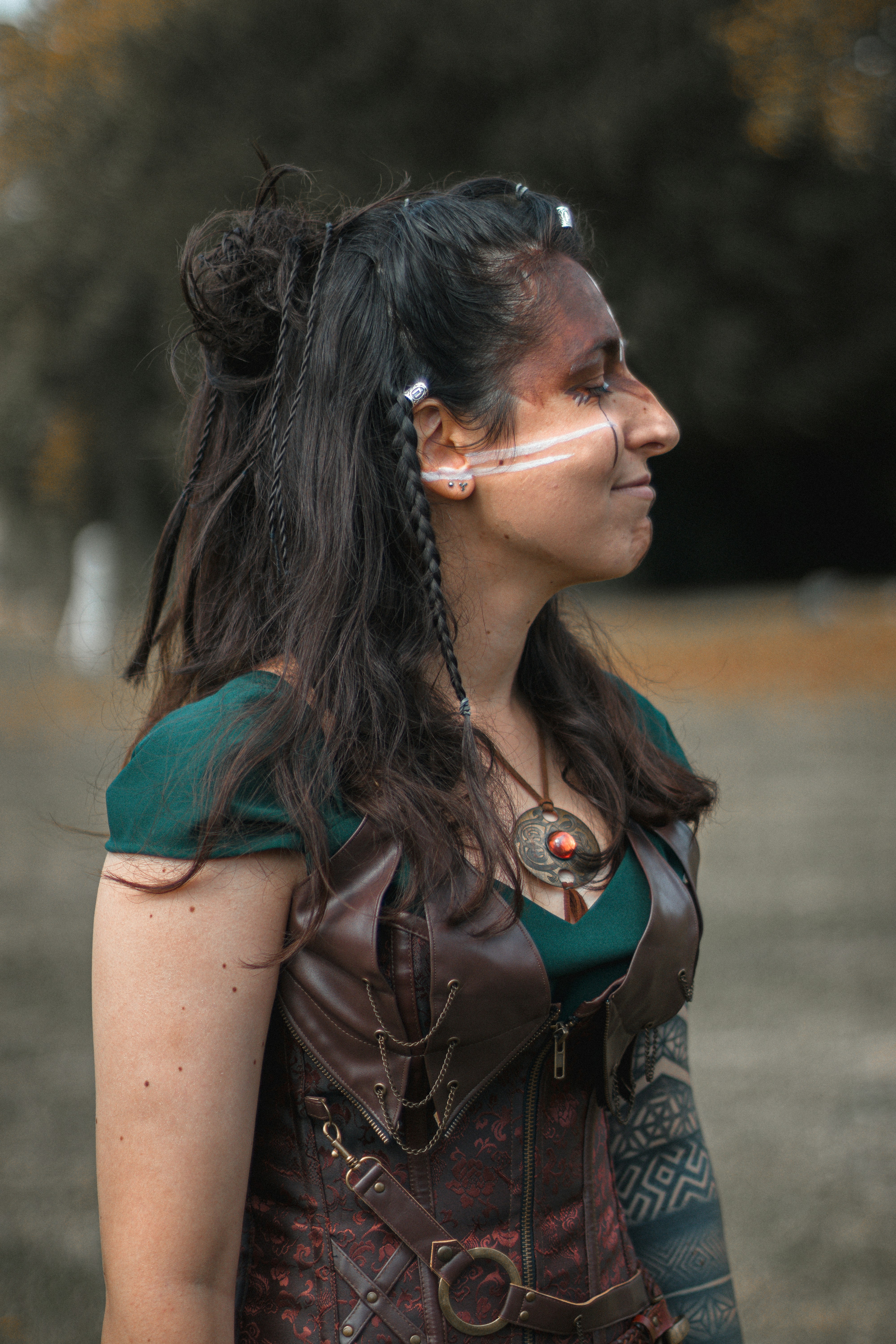 woman wearing yellow long-sleeved dress under white clouds and blue sky during daytime