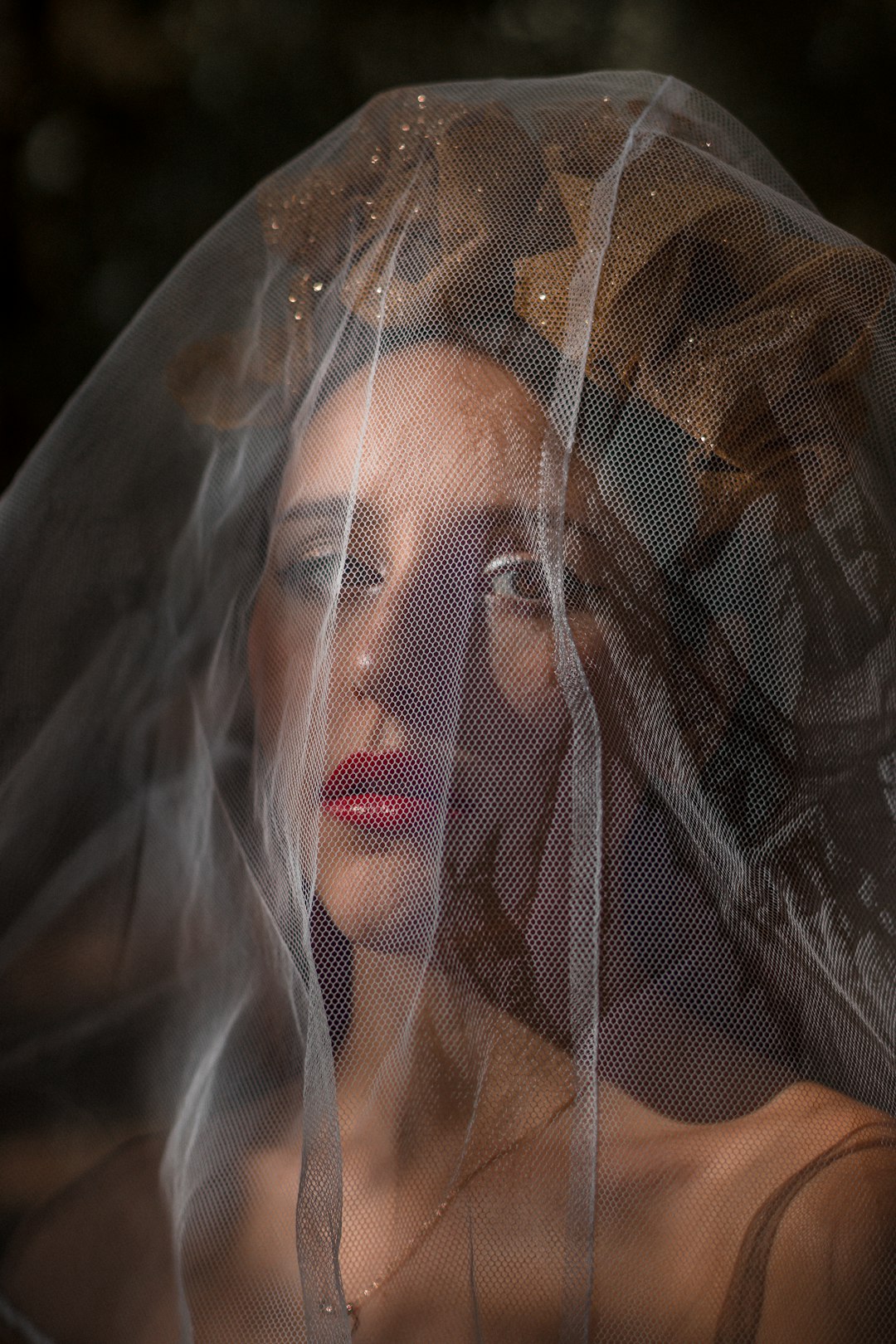 woman in white mesh veil