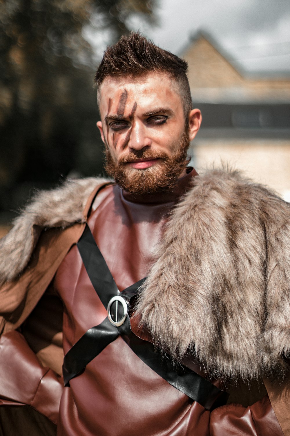 man in brown fur coat