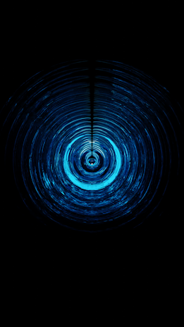 Concentric circles of vibrant blue light ripple outward from the center against a dark background, creating a hypnotic, almost tunnel-like visual effect.