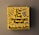 A small yellow canvas displays bold black text that reads 'I'm on the Universe's Payroll' with the artist's signature and date at the bottom. There are blue and gray radial lines emanating from the text, creating a dynamic visual effect.