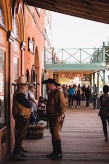 people walking on sidewalk during daytime