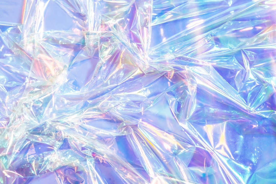 iridescent holographic plastic textured background.  