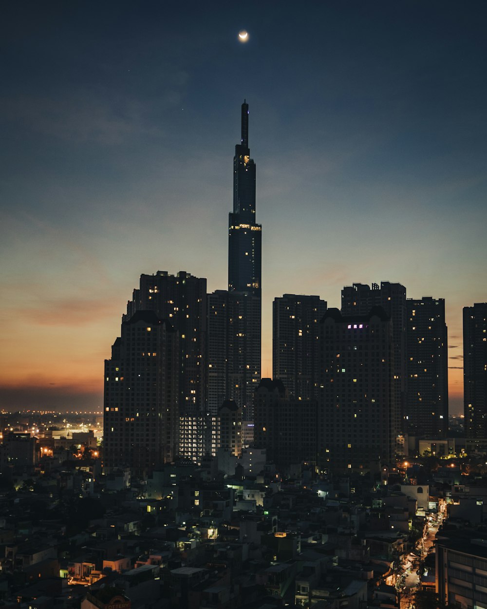 city skyline during night time