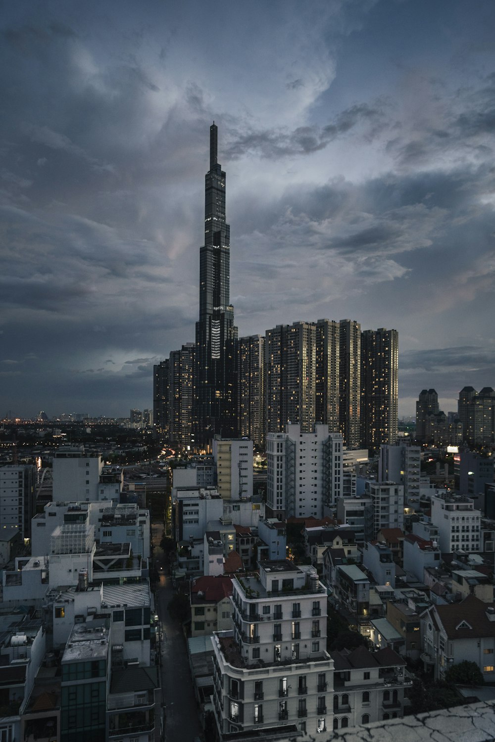 city buildings under gray clouds during daytime