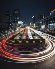 time lapse photography of cars on road during night time
