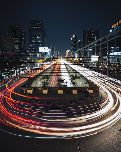 time lapse photography of cars on road during night time