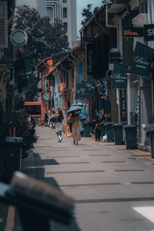 people walking on sidewalk during daytime in Arab Street Singapore