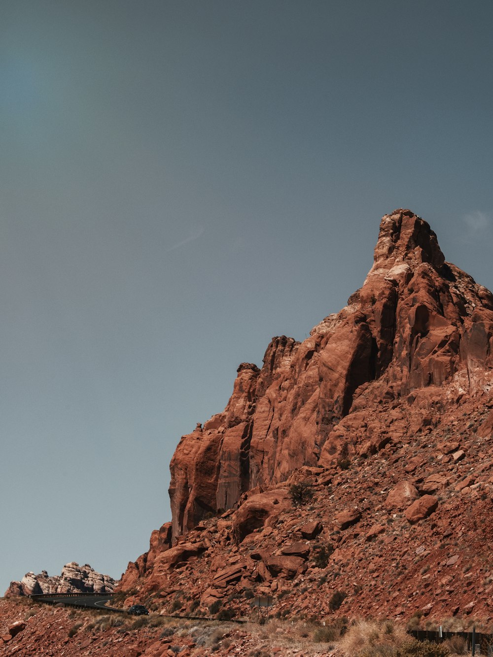 brown rocky mountain under blue sky during daytime