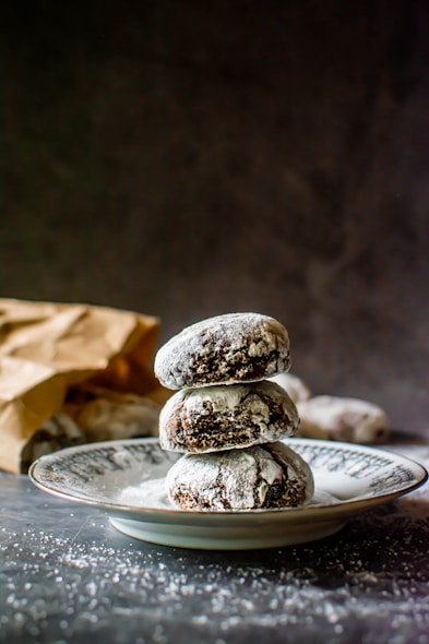 white and brown cookies on silver round plate