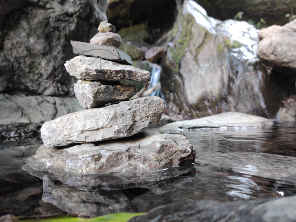 brown rocks on river during daytime