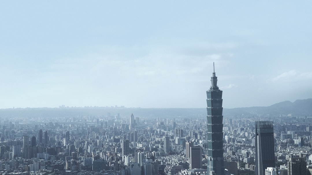 city skyline under white sky during daytime