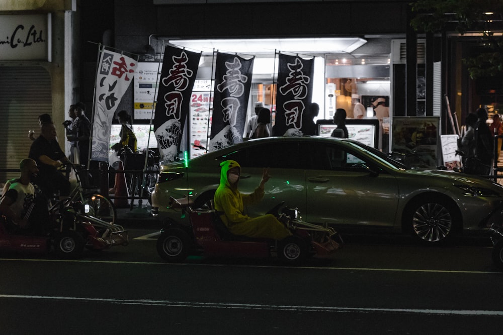 green and black car on street