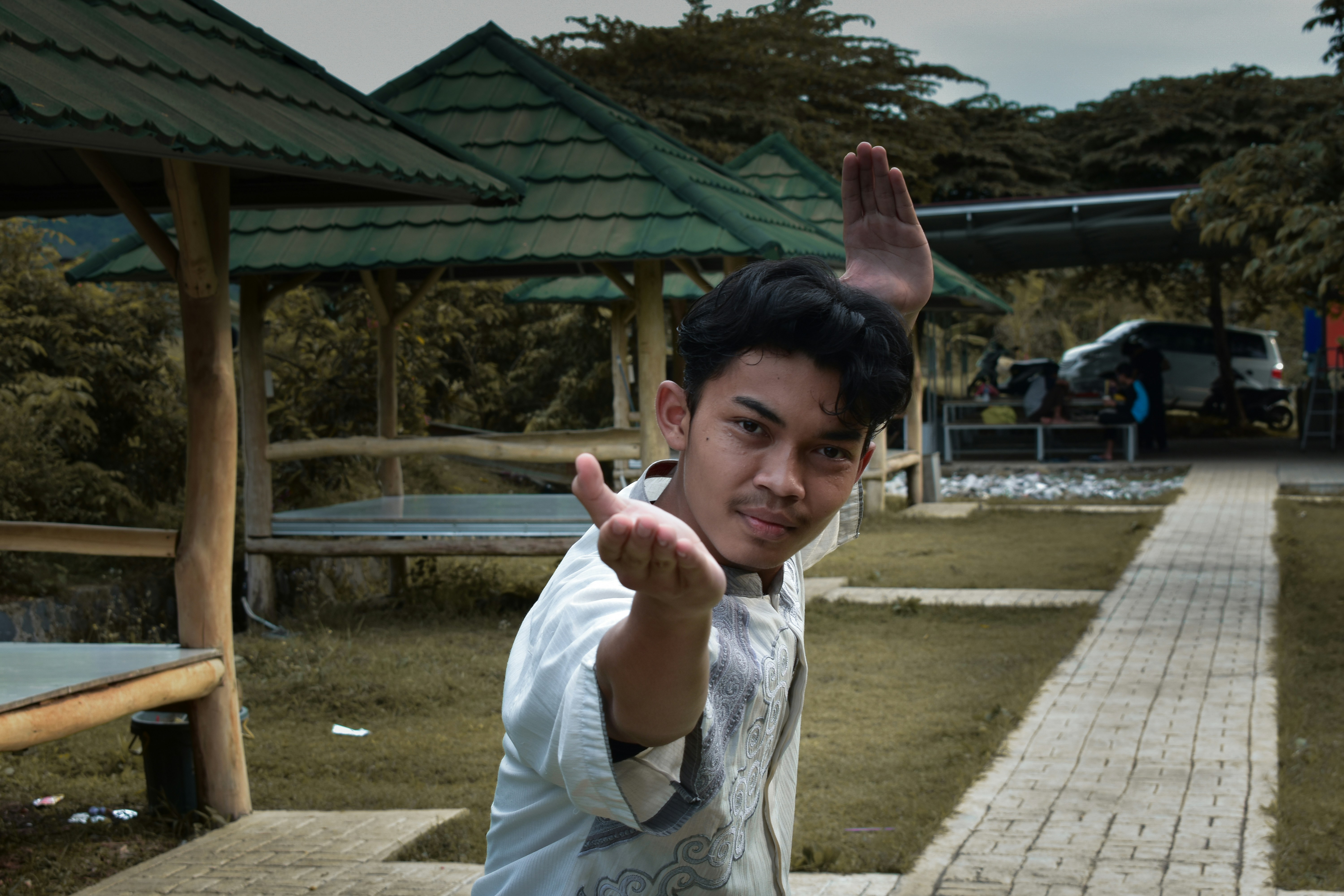 woman in white long sleeve shirt, pencak silat, indonesian martial art.</p><p>most of indonesian boarding school still use pencak silat as their martial art lessons.