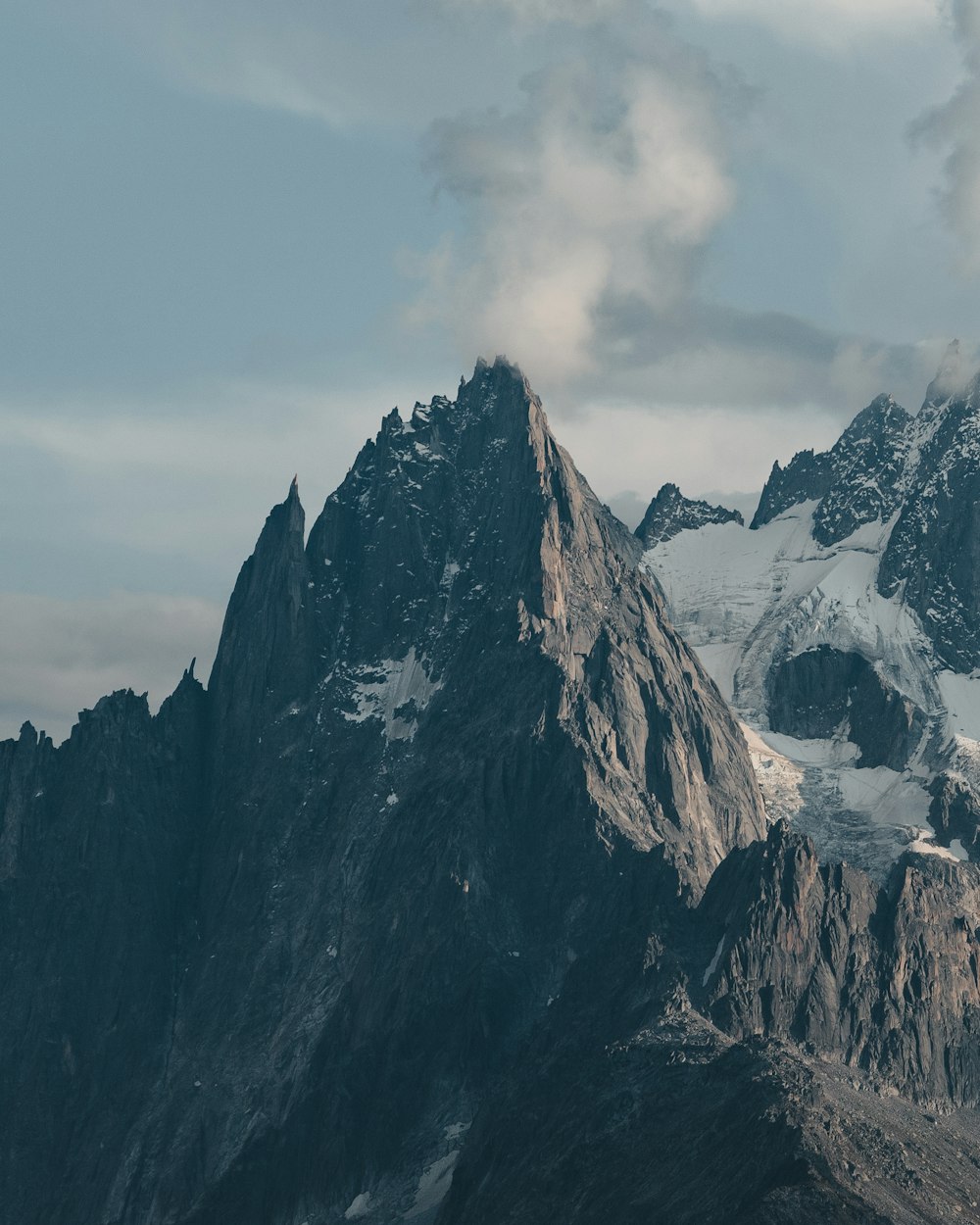 snow covered mountain during daytime