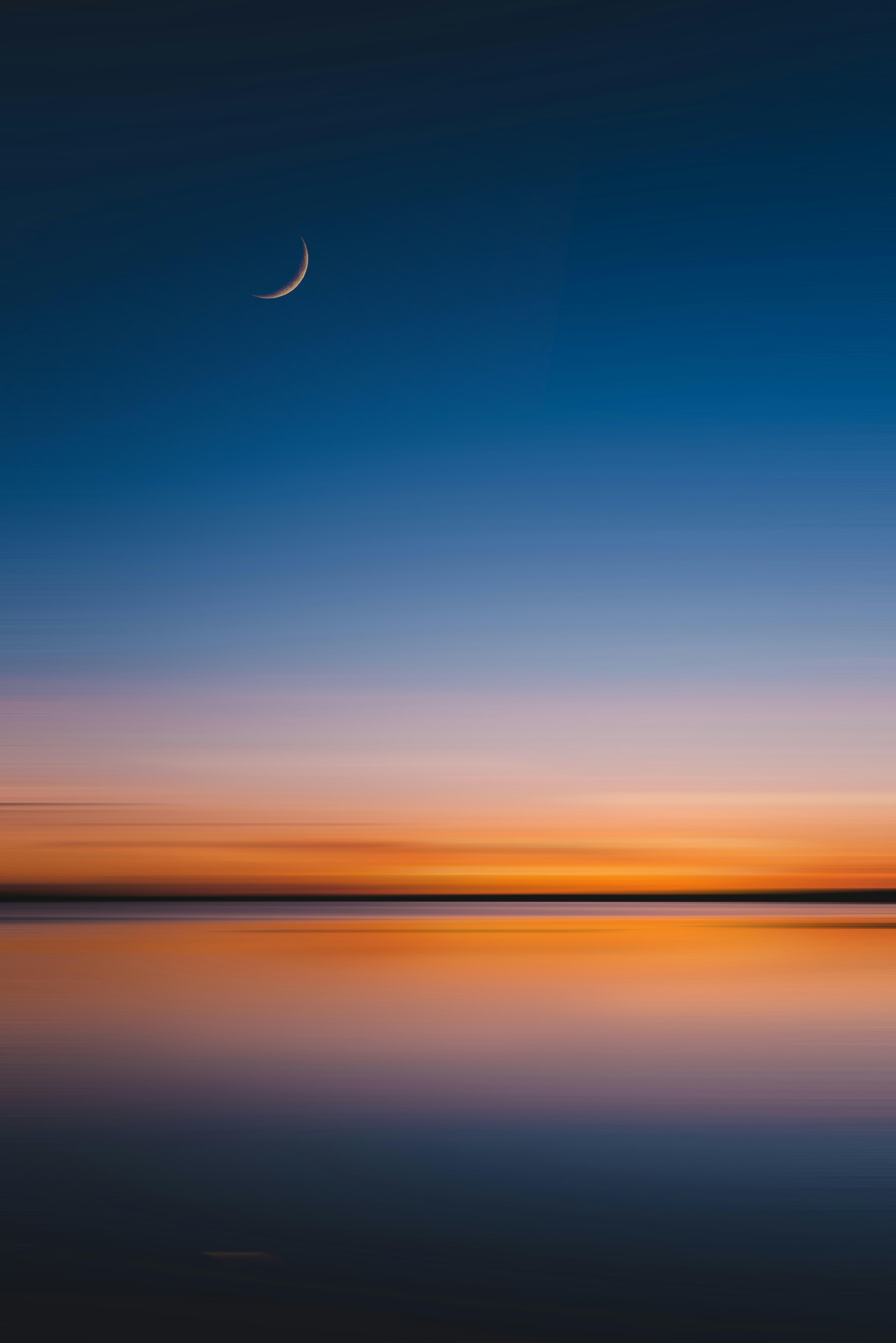 body of water during sunset