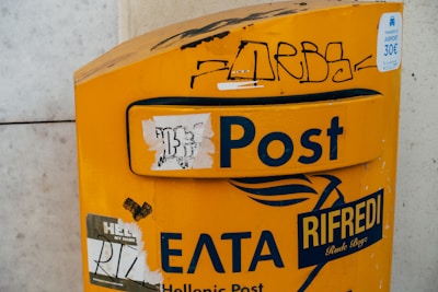 yellow and white caution wet floor sign