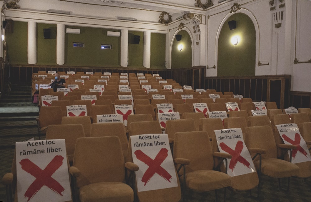 brown and gray chairs inside white room