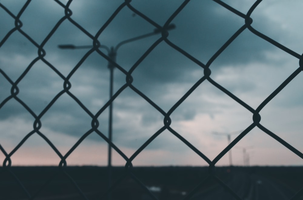 black metal fence during daytime