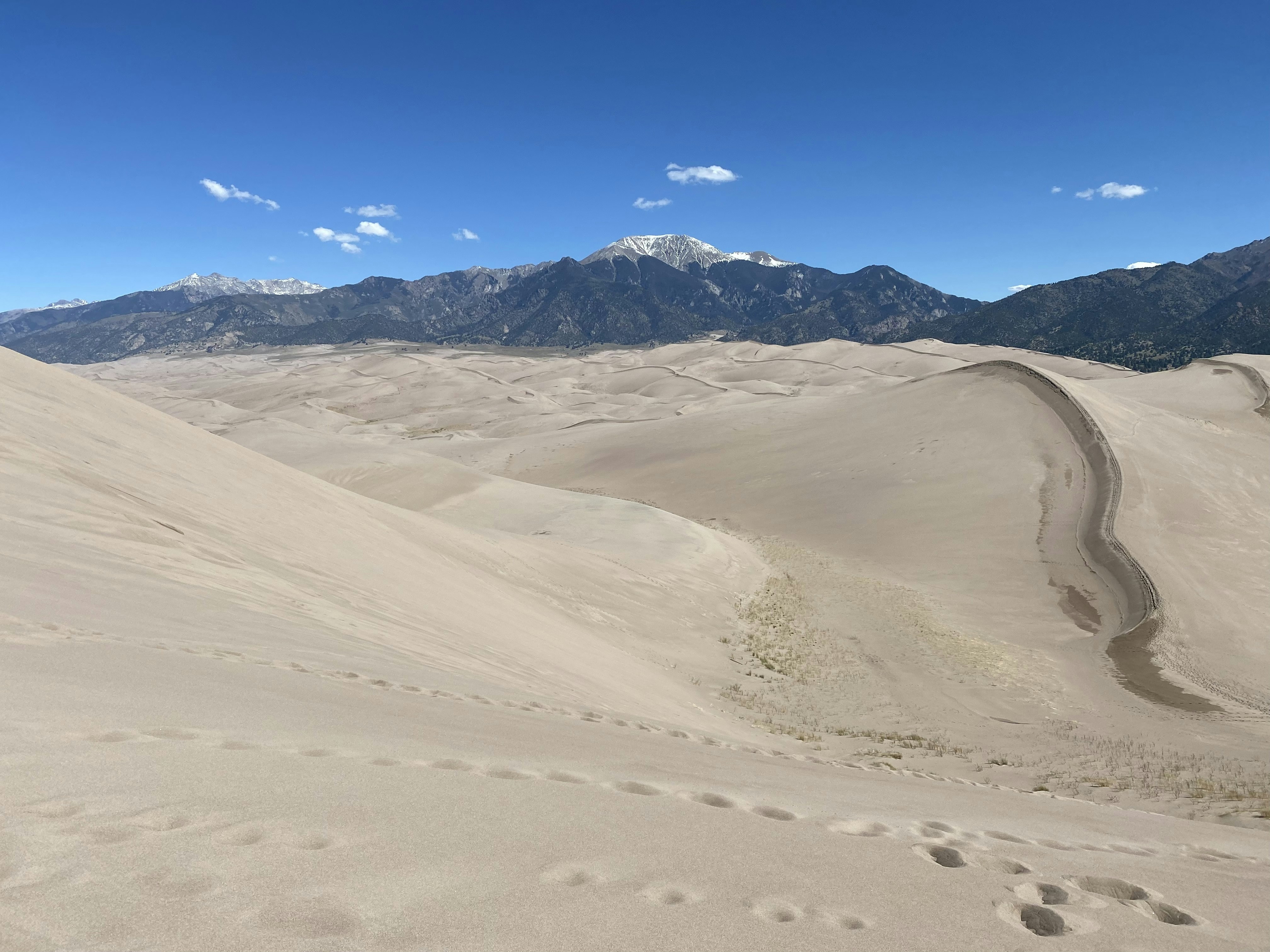 brown sand under blue sky during daytime