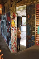 Artistic shot of Joel with graffiti walls reflecting his urban style.